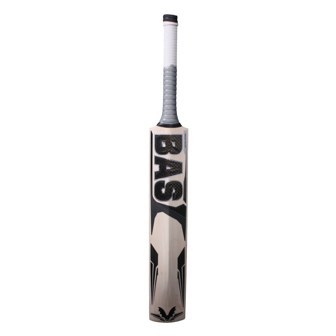The bat of a BAS branded cricket bat, with black and silver stickers, standing against a white background.