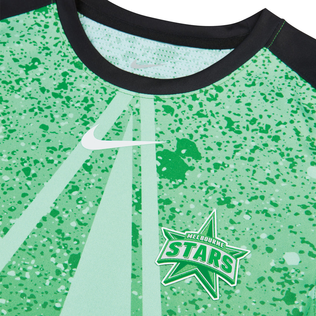 A close up of a replica shirt featuring a green star pattern and the Melbourne Stars logo.