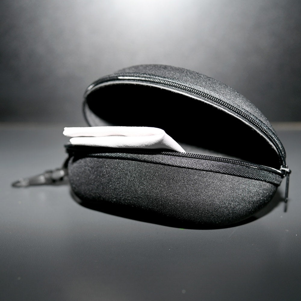 Hard, black sunglasses case with microfibre cleaning cloth.