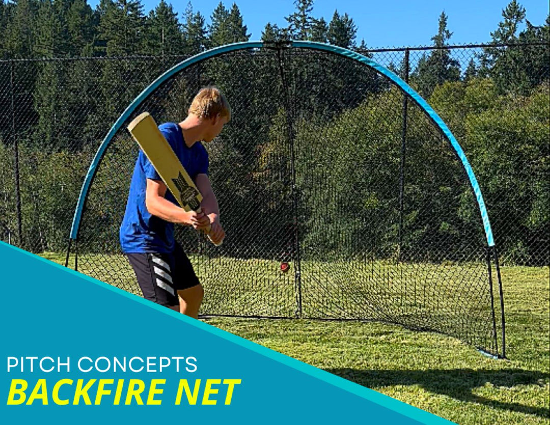 A person practicing cricket batting against a blue and black colored dome-shaped net outdoors.