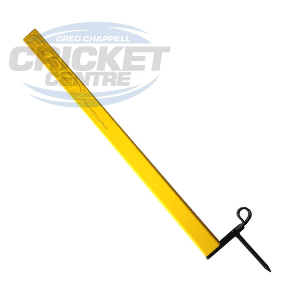 A yellow full-length cricket stump with a spike, against a white background with a watermark text reading 'CRICKET CENTRE'.