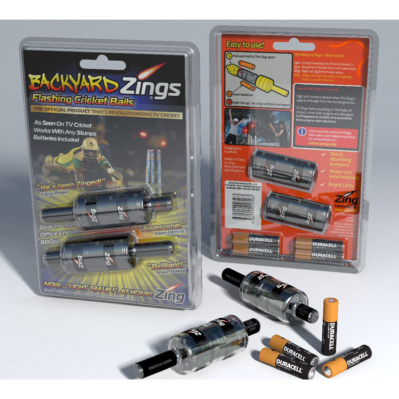 Three sets of  Zings backyard cricket bails, two in their display packaging, one set on the counter with four double A batteries.