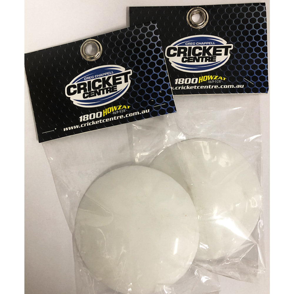 Two white heavy duty plastic bowlers markers with 'CRICKET CENTRE' branding on their packaging.