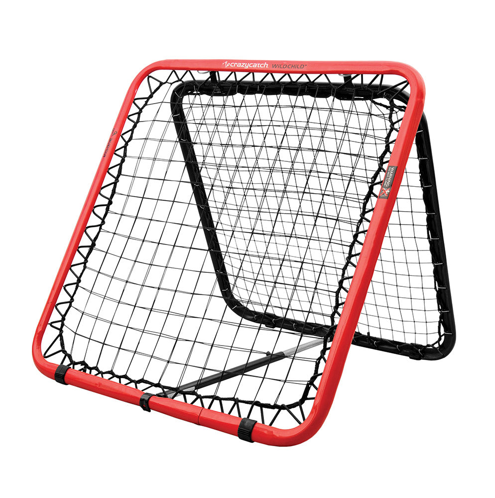 A red and black Crazy Catch Wild Child 2.0 reaction trainer net, with a white vision ball, suitable for indoor or outdoor use.