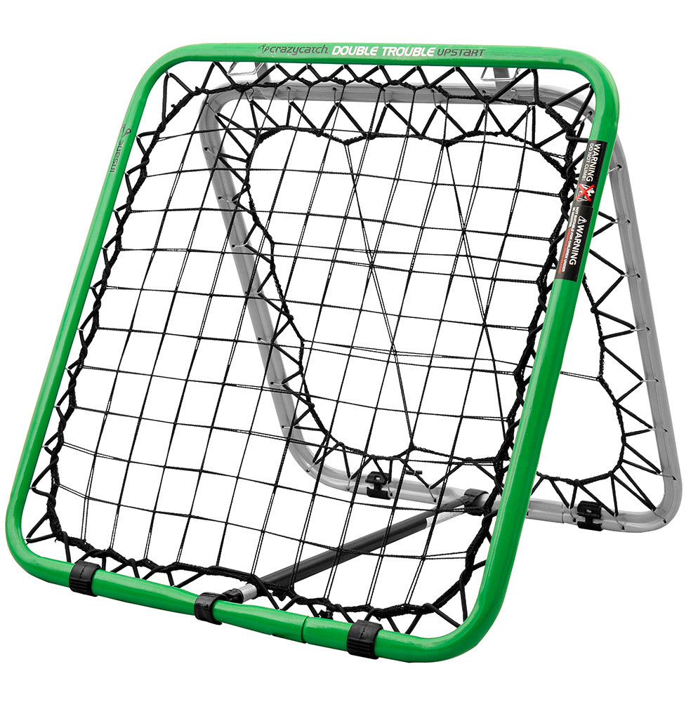 A green and black Crazy Catch sports rebound net, designed for use in various indoor or outdoor sports training activities.