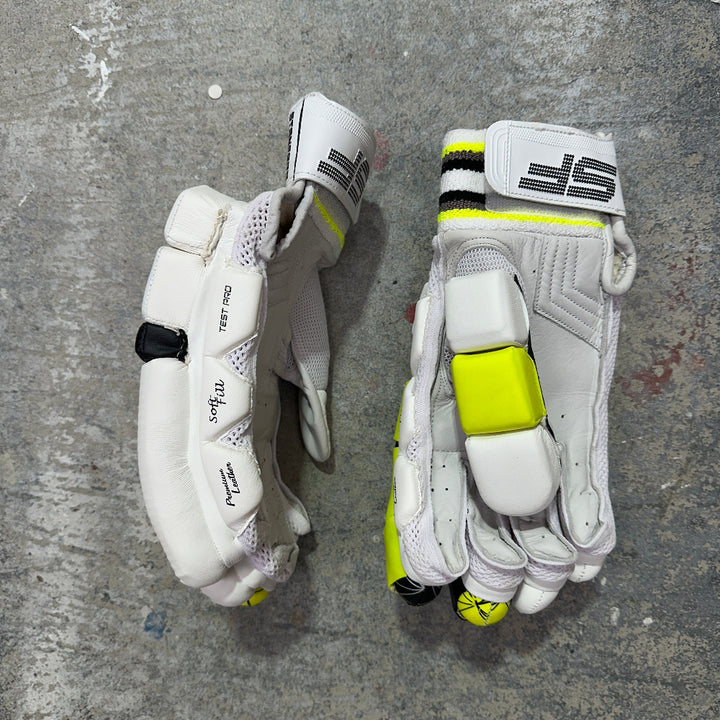 SF cricket batting gloves highlighting the three piece thumb and side bar protection