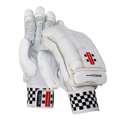 A pair of white GRAY-NICOLLS cricket batting gloves with black detailing and a checkered wristband.