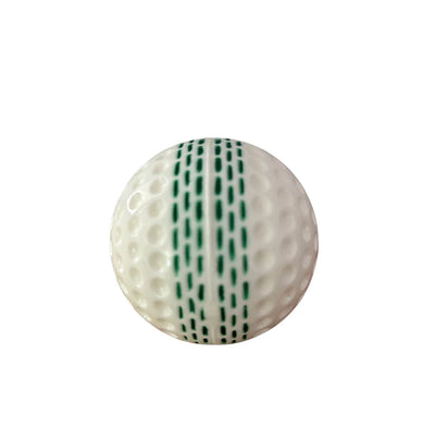 A white bowling machine ball with agreen seam, designed for use in a bazooka bowling machine.