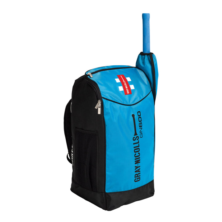 A blue and black GRAY-NICOLLS GN 600 cricket duffle bag with an external pocket and a bat sleeve, featuring adjustable padded shoulder straps and a mesh drink bottle holder.