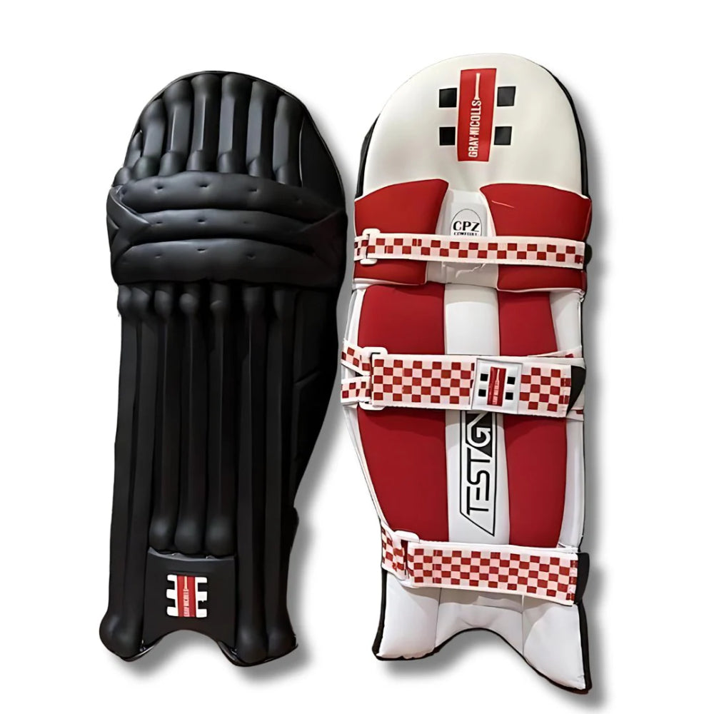 coloured gray-nicolls batting pads with black front and white/red interior.