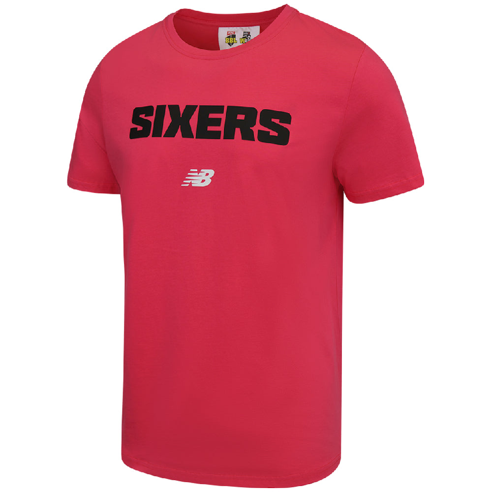 Pink t-shirt with 'Sixers' text and New Balance logo on the front.