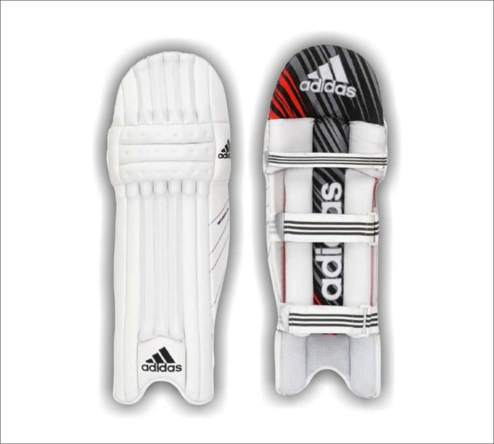 White cricket pads with Adidas logo on a white background