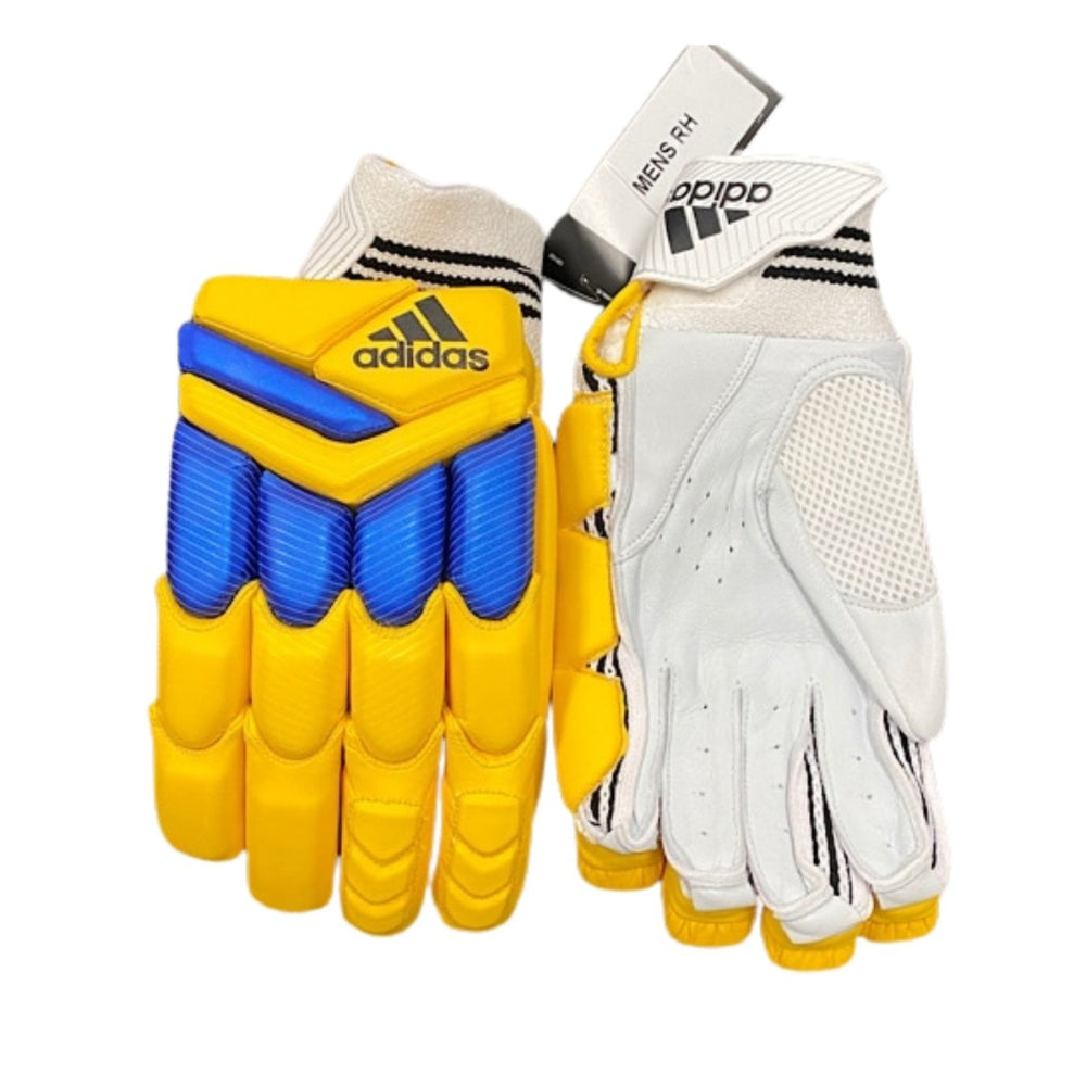 Adidas XT cricket batting gloves in yellow and blue on a white background.