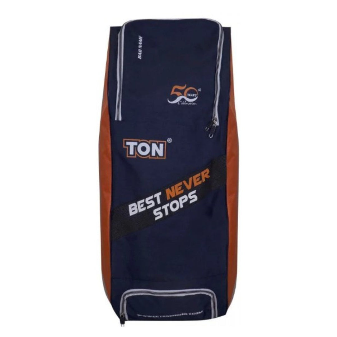 Cricket duffle bag with 'TON' branding. Navy and red with white accents.